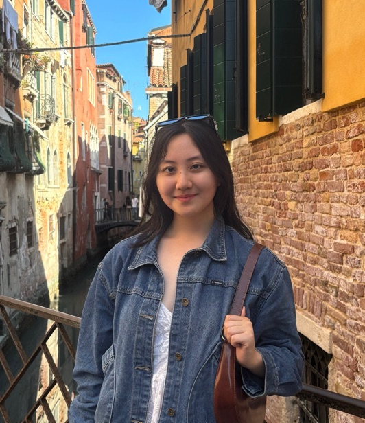 Jane standing by a canal in Venice